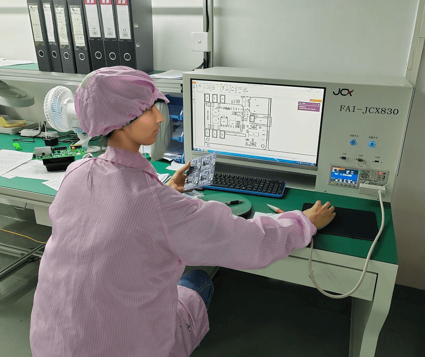 Quality control inspector performing first article inspection on a product